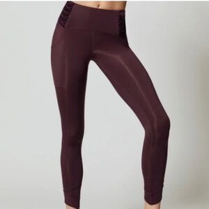 FP Movement Wonderstruck Velvet Criss Cross Leggings Maroon